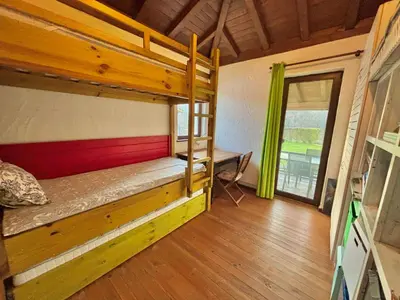 a room with a bunk bed and a desk at Villa Bachevo Horizon in Bachevo