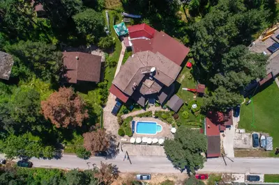 an overhead view of a house with a swimming pool at Vila Kalvachevi in Tsigov Chark