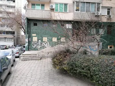a building with graffiti on the side of it at Kapana Comfy 2BR Apartment in Top Center in Plovdiv