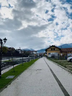 a cobblestone street in a town with a house at ★ Stylish & Cozy Studios in Valentina Heights Boutique Hotel ★ in Bansko