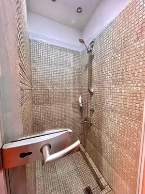 a bathroom with a shower and a sink at Rooms Sonata in Kyustendil