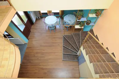 an overhead view of a room with a table and chairs at Family Hotel Studio in Sandanski