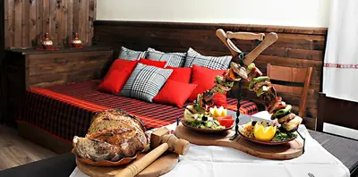 a table with two plates of food on top of it at Hotel Simona Complex in Sofia