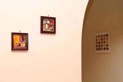 three pictures hanging on a white wall at Central Charming Home with Garden near Parking and NDK in Sofia