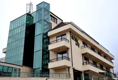 a building with a glass building at Vitoshko Lale Hotel in Sofia