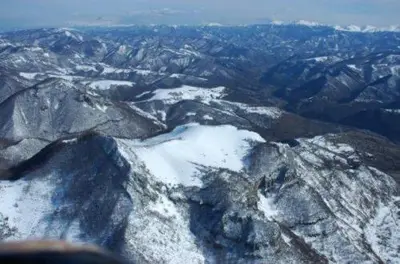 an aerial view of mountains with snow on them at Villa Cherven in Teteven