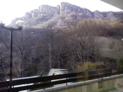 a view of a mountain from a bridge at Villa Cherven in Teteven
