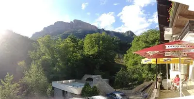 a restaurant with a view of a mountain at Villa Cherven in Teteven