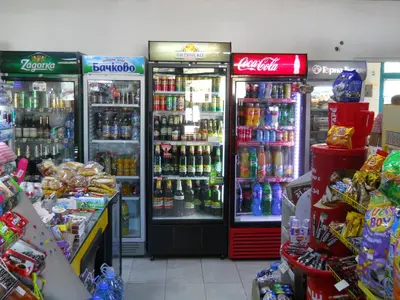 a grocery store with two refrigerators and drinks at Hotel Orient in Blagoevgrad