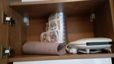 a shelf with towels and other items on it at Grand Monastery - Studio Rossa in Pamporovo