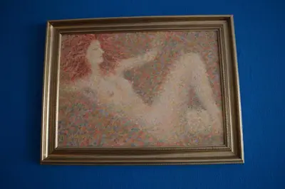 a painting of a woman sitting on a wall at Mansard Art Studio - Central Sofia in Sofia
