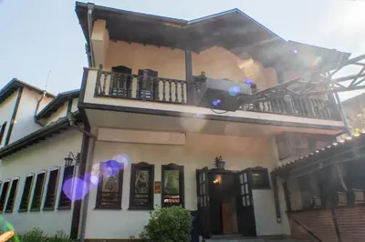a house with a balcony on top of it at комплекс ВОДОПАДА in Plovdiv