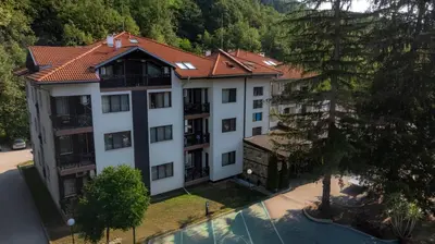 an aerial view of a apartment building with a courtyard at Ostrova Holiday Village in Beli Osŭm