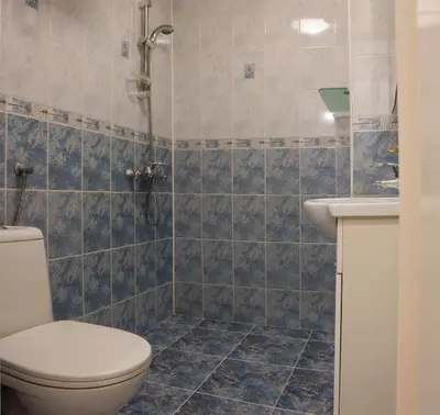 a bathroom with a shower and a toilet and a sink at GLORIOUS - 2-Bedroom apartment near Youth Hill by Flat Mаnager in Plovdiv