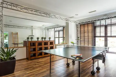 a ping pong table in the middle of a room at Hotel Perun Lodge in Bansko