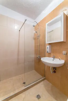a bathroom with a shower and a sink at Comfort.Chic.Charming Apt with Terrace near NDK in Sofia