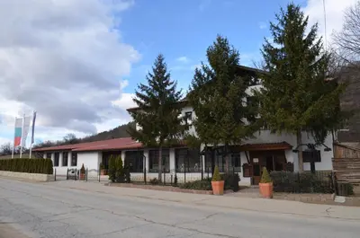 a building on the side of a street at Complex Praveshki Hanove in Pravets