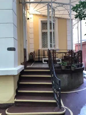 a set of stairs leading up to a house at Come inn - 24h Self Check-in in Sofia