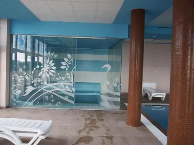a room with a mural on the wall at A-Apartment in Krasnovo