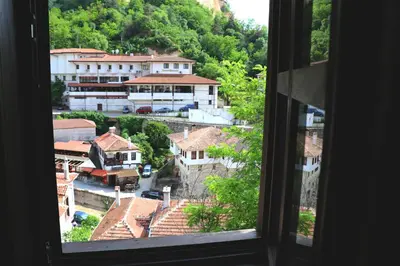 a view from a window of a town with buildings at Hotel Slavova Krepost in Melnik