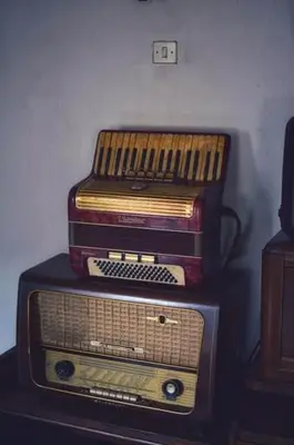 a stack of four piles of music equipment on a table at Zlatna ribka in Kokolyane