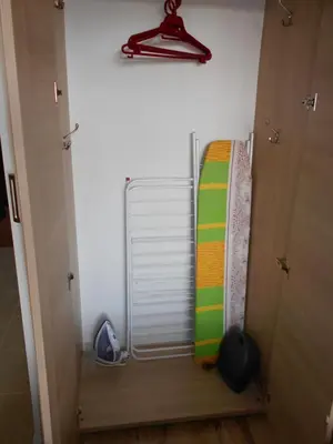 a room with a heater and a snowboard in it at NICE STUDIO in 