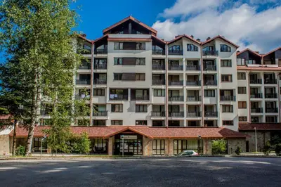 an apartment building in front of a street at NICE STUDIO in 