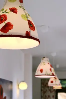 two lights hanging from the ceiling in a room at The Poppies House in Pamporovo