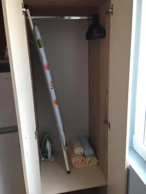 two baseball bats are in a closet at Campbell's central apartment in Sofia