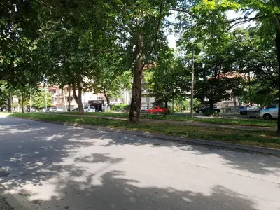 a street with trees on the side of the road at The Place -Apartments in Plovdiv, with private parking in Plovdiv