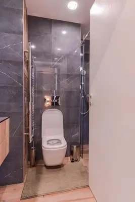 a bathroom with a toilet and a shower at Urban Eden - LUX & STYLE, 2-Bedroom, 2-Bathroom in Sofia