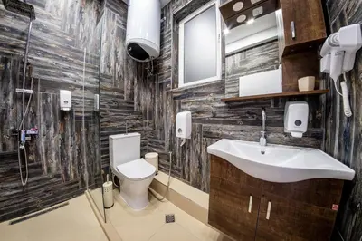 a bathroom with a sink and a toilet at Sofia Downtown Life Apartment in Sofia