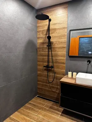 a bathroom with a shower and a sink at Deluxe 217 in Borovets