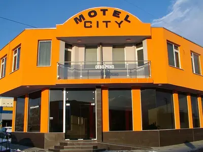 an orange building with the words wolf city on it at МОТЕЛ СИТИ с БЕЗПЛАТЕН ПАРКИНГ in Plovdiv