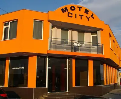 an orange building with the words motel city on it at МОТЕЛ СИТИ с БЕЗПЛАТЕН ПАРКИНГ in Plovdiv
