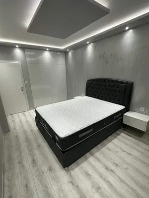a bedroom with a large bed in a room at lux in Plovdiv