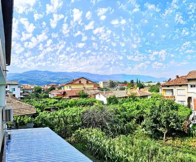 a view of a town with mountains in the background at Merilyn Petrich in Petrich
