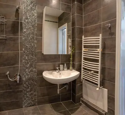 a bathroom with a sink and a mirror at Studio Talisman in Sofia