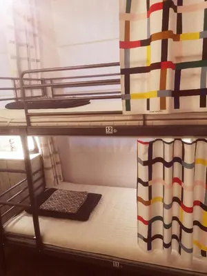 a bunk bed in a room with a bunk bed gmaxwell gmaxwell gmaxwell gmaxwell at PIJAMA HOUSE - Bike & Bed in Plovdiv
