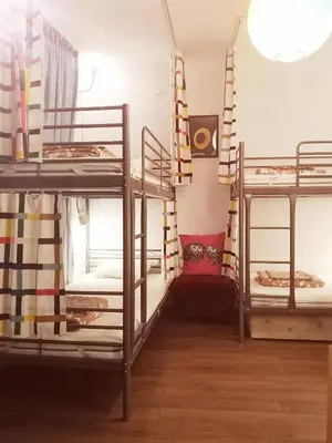 a group of bunk beds in a room at PIJAMA HOUSE - Bike & Bed in Plovdiv