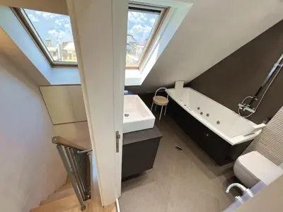 a bathroom with a sink and a bath tub at Unique Luxurious Jacuzzi PENTHOUSE DUPLEX in City Center! 2 BATHS! FREE PARKING! in Sofia