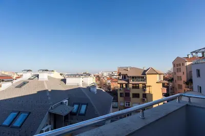 a view of a city from a balcony with buildings at Stunning location and views!Foothills of Old town! in Plovdiv