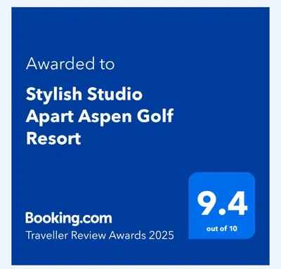 a blue sign with the text emailed to sykrit studio apart aspen golf resort at Stylish Studio Apart Aspen Golf Resort in Razlog