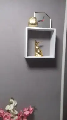 a shelf with a statue of a rabbit on it at MVK in Sofia