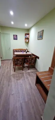 a room with a pool table in the corner of a room at Lucy's Apartments Emerald in Bansko