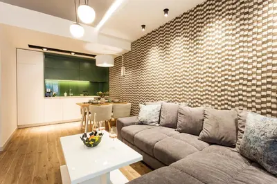 a living room with a couch and a table at SCA Sofia City Apartments in Sofia