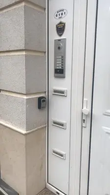 a door with a parking meter next to a building at Dara House in Plovdiv