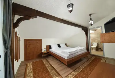 a bedroom with a bed in a room at Къща за гости Елица in Starchevo