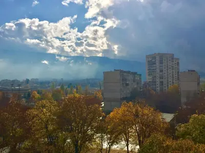 a view of a city with trees and buildings at Faith,Hope and Love apartment in Sofia