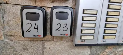 two numbers on the side of a brick wall at BanskoSuperSki in Bansko